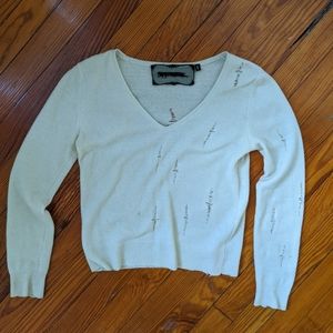 rare distressed reformation sweater